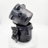Vaso carita de barro negro