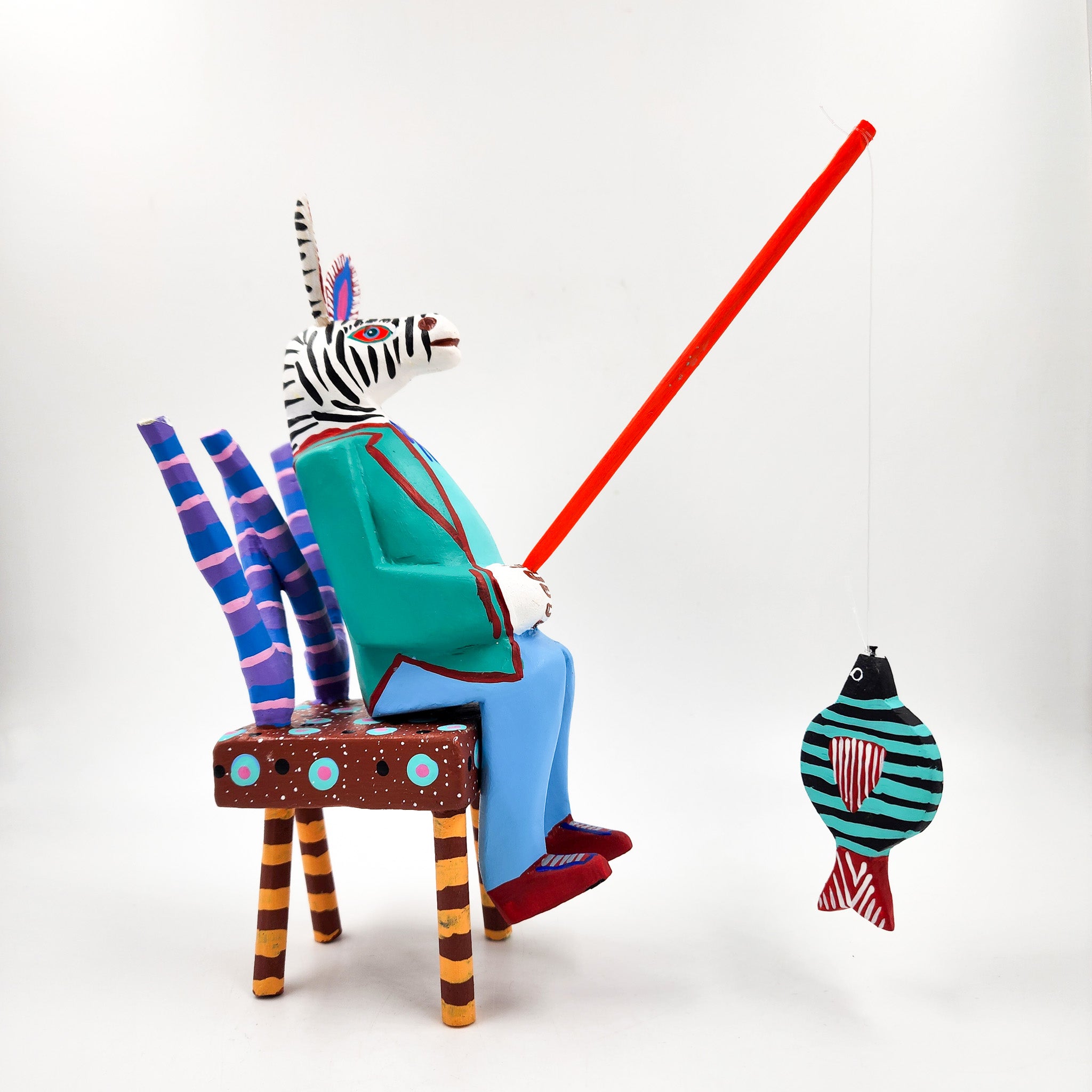 Zebra pescador talla de madera - Tona o Nahual