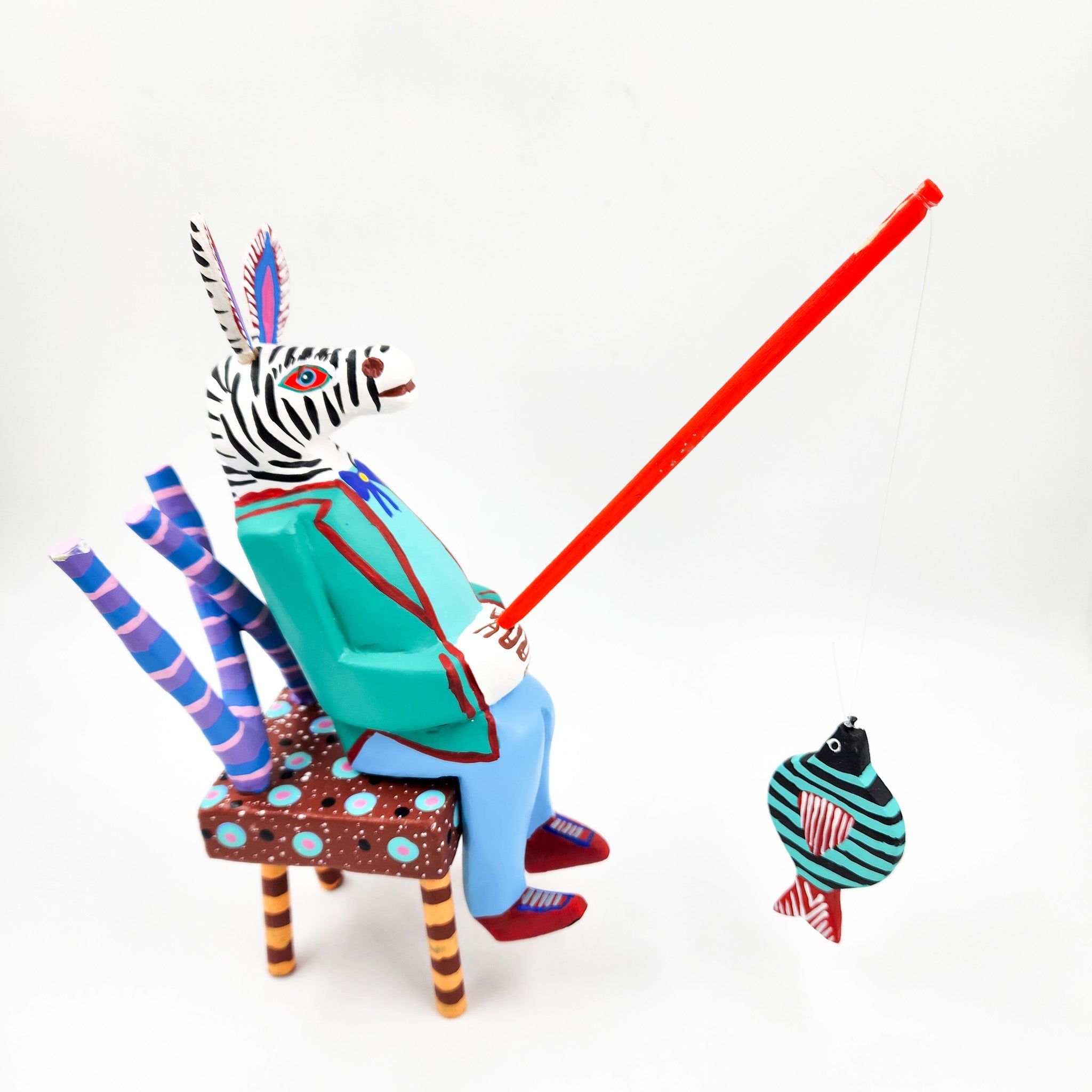 Zebra pescador talla de madera - Tona o Nahual